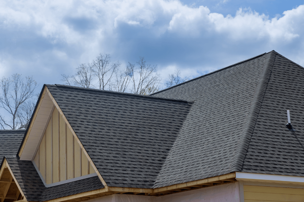 Complex Tudor roof valley and gable repair in Park Hill, Denver, CO