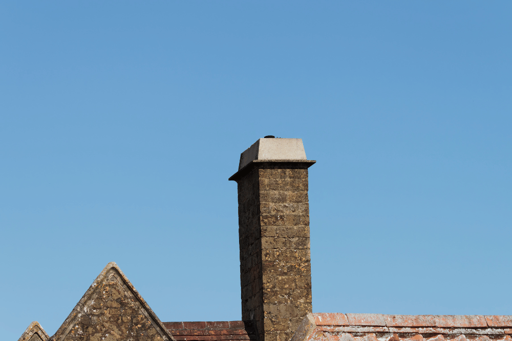 Tudor roof chimney and masonry transition in Park Hill, Denver, CO