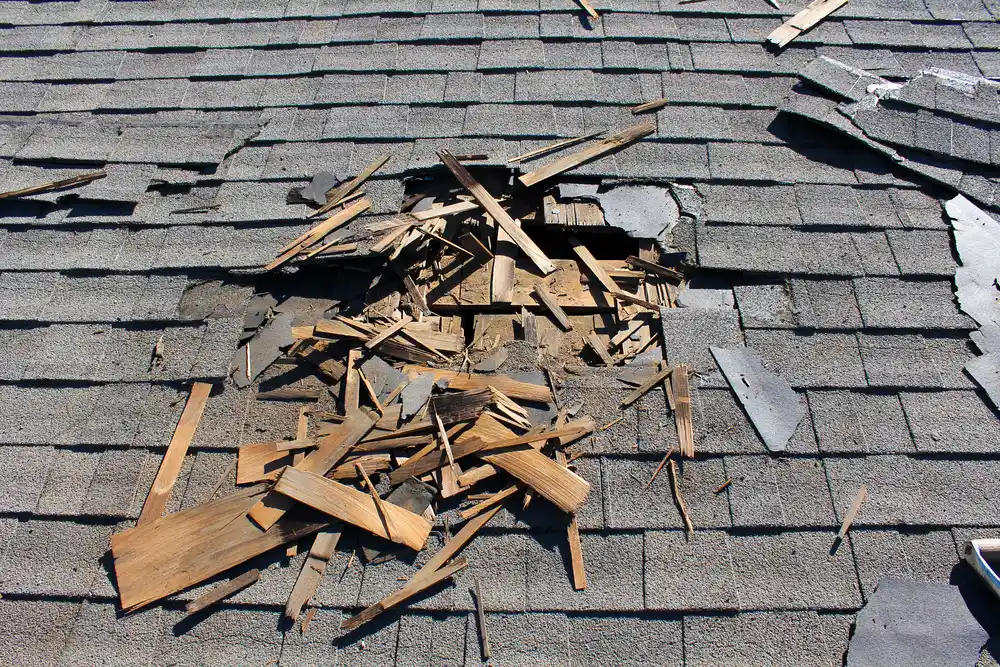 Roof with damage after a storm in Park Hill, Denver, CO
